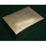 A Columbian silver coloured metal large rectangular cigar box, with presentation inscription to