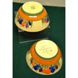 A pair of Clarice Cliff china crocus pattern bowls. (One with hairline cracks.)