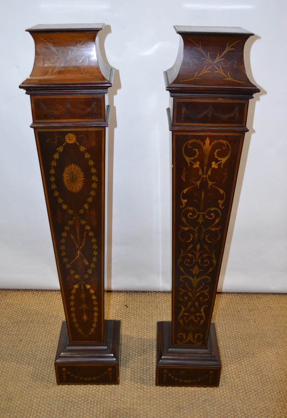 A pair of nineteenth century Sheraton Revival mahogany pedestals, inlaid marquetry foliage, Neo