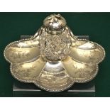 A Victorian silver inkstand, the scalloped base with engraved foliage and a presentation