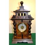 A late nineteenth century French mantle clock, the 8 day striking movement with a musical