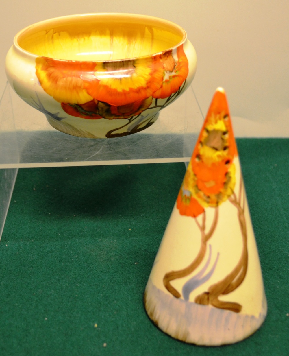 A Clarice Cliff Bizarre pattern sugar cone caster. 5.75in (14.5cm) and a Clarice Cliff Bizarre