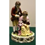 An early Victorian Samuel Hall Derby porcelain group, of a gentleman standing by a seated lady, in c