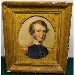 A Victorian oval crayon portrait of a young Naval Officer. 9.25in (23.5cm) x 7.25in (18.5cm) in a