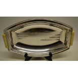 An art Deco electroplated Sheffield made ovoid bread dish, with engraved stepped bands and two