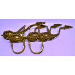 A set of four French belle epoque ormolu rococo curtain wall ties, with cartouche terminals. 15in (