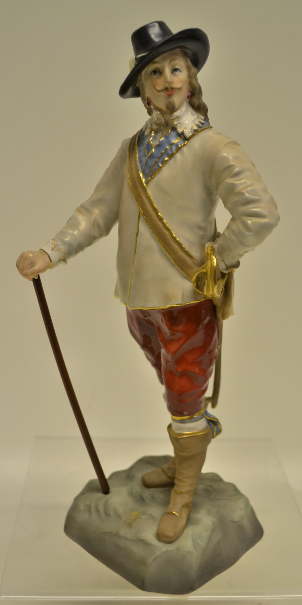 An early Royal Worcester porcelain version of King Charles 1st, dressed for battle, standing on