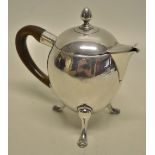 An early George II silver egg shape hot milk jug, the spout with a lid having an extension, a pear