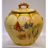 A late Victorian Royal Worcester porcelain blush ivory labelled jar with cover, decorated flowers to