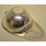 A George III silver jockey cap caddy spoon, with bellflower engraved border and tied ribbon back.