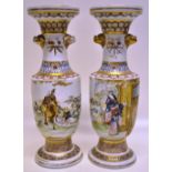 A pair of late nineteenth century Japanese porcelain vases, depicting a nobleman on horseback with