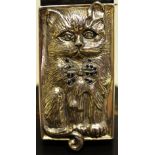 A mid twentieth century cast repouse novelty silver coloured metal vesta case, depicting a cat