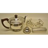 A circular silver teapot, with a gadroon rim, a swan neck spout detachable bakelite finial to the
