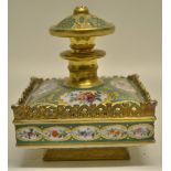 An early nineteenth century French porcelain square scent decanter, with a gilt stopper, gilt