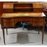 A late Victorian Sheraton Revival mahogany bonheur du jour, with marquetry inlay, a damaged