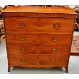 A Regency faded mahogany veneered secretaire, the top with a frieze moulding above a fitted