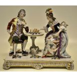 A mid twentieth century Naples porcelain group, of a lady and gentleman in eighteenth century