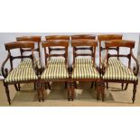 A set of eight William IV/ early Victorian mahogany dining chairs, with tied bar backs, padded seats