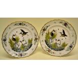 A pair of late nineteenth century Naples porcelain plates of the Swan service, depicting in relief a