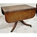 An early nineteenth century mahogany single pedestal extending dining table, the drop leaf