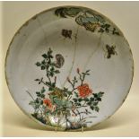 A Kang Hsi Chinese porcelain saucer dish, decorated blossom and insects in famille verte enamels,
