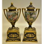 A pair of nineteenth century Vienna porcelain urns and covers, painted Diana, Cupid and a fawn, gilt