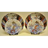 A pair of late nineteenth century Japanese Imari porcelain shell fluted dishes, decoration of