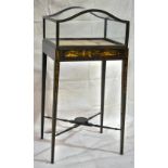 An antique black and gold lacquered bijouterie, with oriental style decoration, the glazed