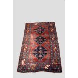 Kazak rug, south west Caucasus, early 20th century, 8ft. 10in. x 5ft. 7in. 2.69m. x 1.70m. Overall