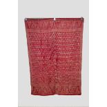 Two Indonesian shawls, 20th century, the first red cotton with all over brocaded silk details, two