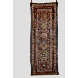 Kazak hooked polygon long rug, south west Caucasus, early 20th century, 9ft. 2in. x 3ft. 4in. 2.80m.