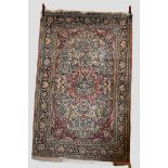 Kashmiri silk rug, north India, mid-20th century, 6ft. 2in. x 3ft. 11in. 1.88m. x 1.20m. Slight wear