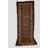 Kuba floral lattice long rug, north east Caucasus, late 19th century, 11ft. 11in. x 4ft. 1in. 3.63m.