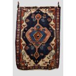 Bijar ghileem, north west Persia, circa 1920s, 5ft. 5in. x 3ft. 9in. 1.65m. x 1.14m. Some wear; some