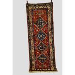 Good Karabakh long rug, south west Caucasus, last quarter 19th century, 10ft. x 3ft. 8in. 3.05m. x
