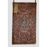 Esfahan rug, south west Persia, circa 1920s, 5ft. 6in. x 3ft. 2in. 1.68m. x 0.97m. Overall wear;