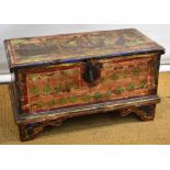 An antique Mediterranean painted wood coffer, decorated a view of a town, the front with an iron
