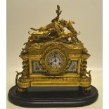 A nineteenth century French mantel clock, the 8 day movement striking on a bell, the ormolu case