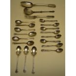 A Regency fiddle pattern silver table spoon and a dessert fork crested, London 1809, four triform