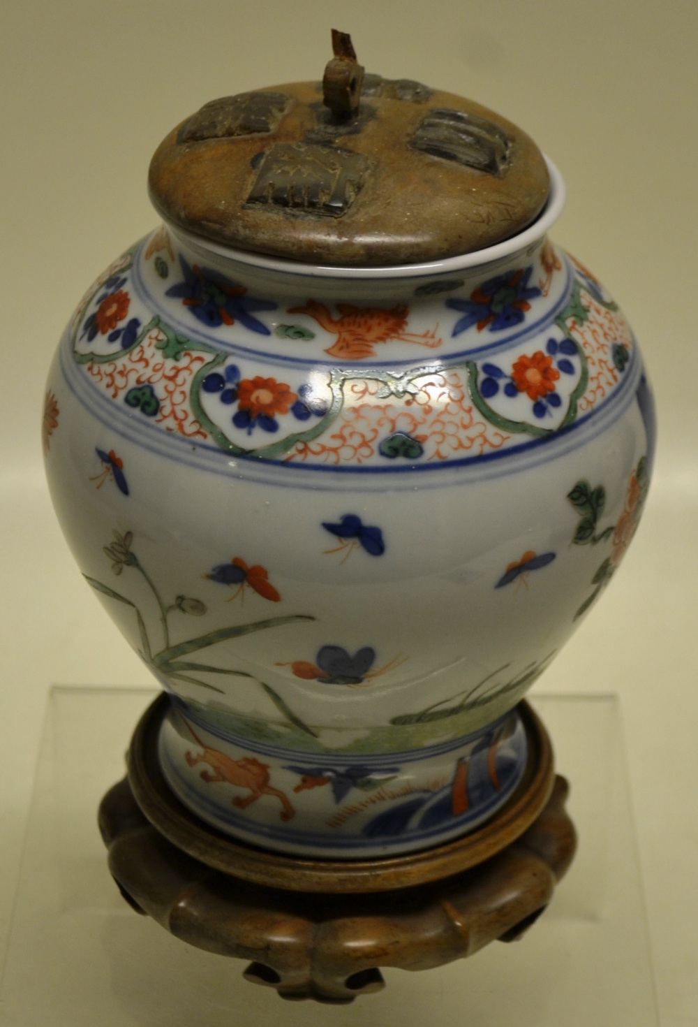 A Chinese Wuci porcelain baluster vase, decorated in underglaze blue and overglaze famille verte