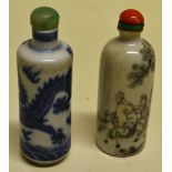 Chinese cylindrical blue and white porcelain snuff bottles one decorated a five claw dragon and