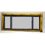 A Regency landscape overmantle mirror, the three plates with a reeded ebonized slip a gothic