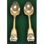 A pair of Regency silver fiddle thread and shell pattern tablespoons. Maker Paul Storr, London 1814.