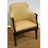 A Regency mahogany show frame writing armchair, upholstered in fine floral print, the reeded front