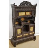 A late nineteenth century Japanese carved wood Shodona, the top with golden lacquer panels applied