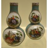 A small pair of nineteenth century German porcelain double gourd shape vases, depicting couples in a