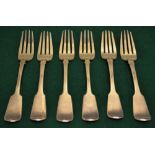 A set of six William IV Irish silver fiddle pattern table forks, engraved a crest. Maker Edward