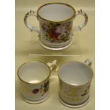 Two Victorian Coalport mugs, decorated flowers and in gilt 'Anna P. Maxon' and 'What'wa E. Ashtown,'