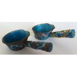 Two twentieth century silvered wine cups, with side handles, coloured enamel decoration of