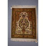Attractive Hereke silk prayer mat with inscription in top right corner outer guard; south west